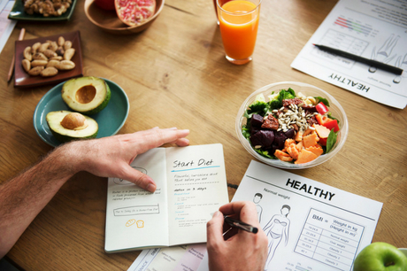 Person creating a meal plan.