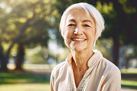 Woman with a pulmonary condition enjoying time in the park
