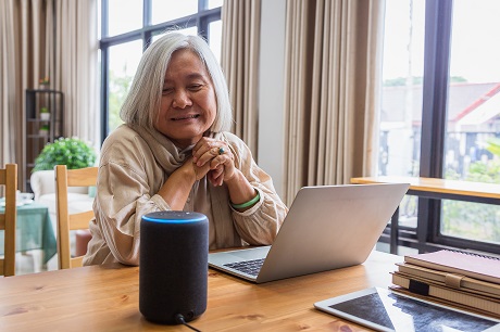 A woman using a digital assistant