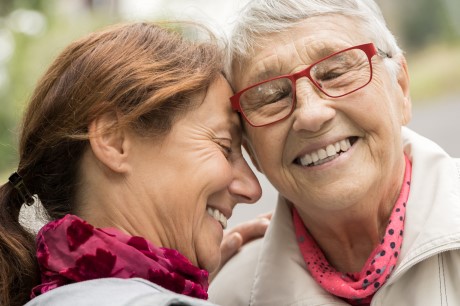 Two people smiling