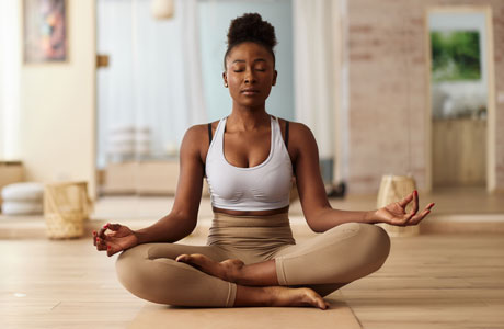 A woman doing yoga.