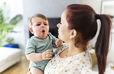 A baby coughing.