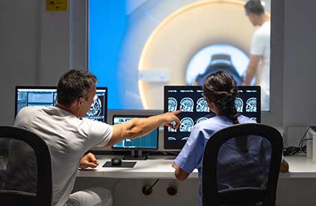 Medical professionals looking at scans