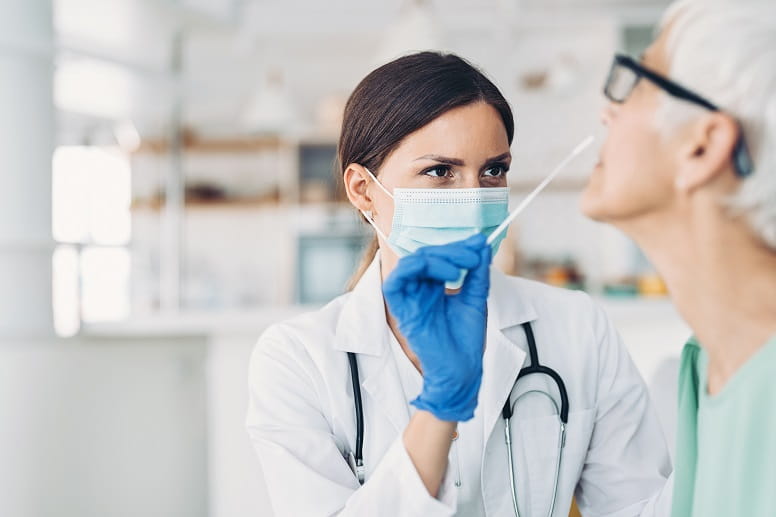 A woman getting a covid test